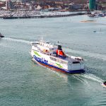 The Stena Vinga leaves Portsmouth International Port with an escort of tugs, one of which is firing its water canon
